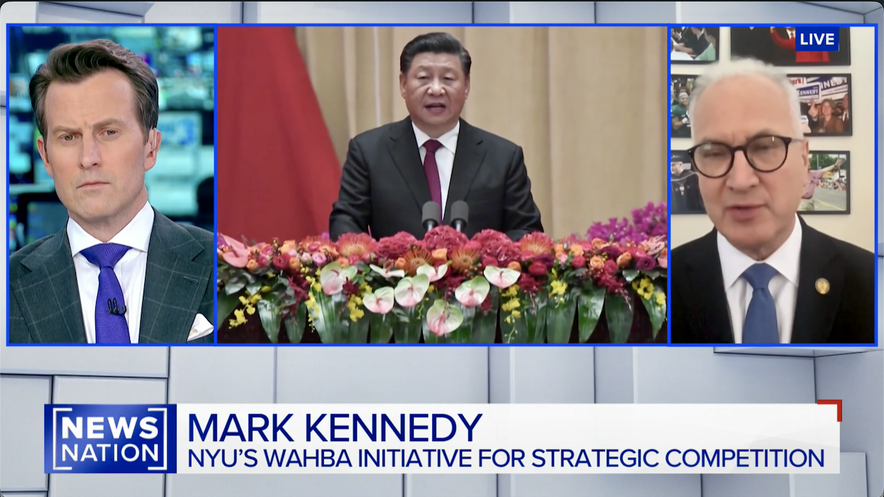 A news broadcast shows three panels: a serious male anchor on the left, a central image of Xi Jinping speaking behind a flower-adorned podium, and a man with glasses on the right labeled as Mark Kennedy.